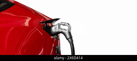 Isolated part of red electric car with connected electric charger. Stock Photo