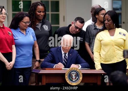 Washington, USA. 14th May, 2024. US President Joe Biden signs documents related the China tariffs in the Rose Garden of the White House in Washington on May 14, 2024. Photo by Yuri Gripas/Pool/Sipa USA Credit: Sipa USA/Alamy Live News Stock Photo