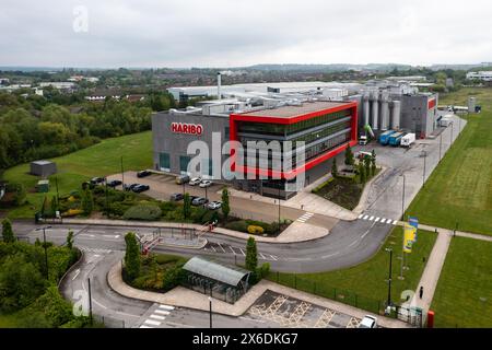 CASTLEFORD, UK - MAY 7, 2024.  Aerial landscape view of the modern architecture of the HARIBO distribution warehouse allowing the sweets company to in Stock Photo