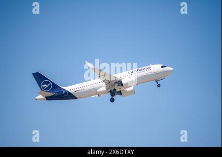 13.05.2024, Berlin, Germany, Europe - A Lufthansa Airbus A320neo passenger aircraft takes off from Berlin Brandenburg Airport BER. Stock Photo