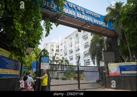 NEW DELHI, INDIA - MAY 14: Patient seen gathered outside the Deep Chand Bandhu Hospital as the Bomb Squad from Delhi Police carries out search operation reportedly after a bomb threat was received in the early hours of morning at Ashok Vihar on May 14, 2024 in New Delhi, India. Four Delhi hospitals, including Deepchand Bandhu Hospital, Dada Dev Hospital, Hedgewar Hospital and Guru Teg Bahadur (GTB) Hospital, received bomb threat emails on Tuesday, two days after similar messages were sent to 20 hospitals, the airport and the office of the Northern Railways' CPRO in the capital, officials said. Stock Photo