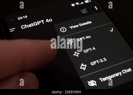 GPT-4o model  seen with GPT-4 and GPT-3.5 in ChatGPT app on the smartphone. Selection between language models in paid OpenAI account. Stafford, United Stock Photo