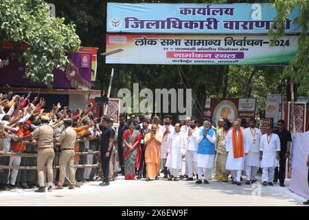 Varanasi, India. 14th May, 2024. Indian Prime Minister Narendra Modi (C) leaves accompanied by India's Home Minister Amit Shah (R) and Uttar Pradesh Chief Minister Yogi Adityanath (L) after filing his nomination papers for the general elections in Varanasi. Credit: SOPA Images Limited/Alamy Live News Stock Photo