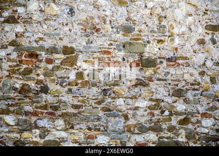 multi-coloured distressed brick wall, for backgrounds or textures, abstract with copyspace Stock Photo