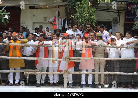 Varanasi, India. 14th May, 2024. Supporters of India's Prime Minister Narendra Modi wait for his arrival for filing his nomination papers for the general elections in Varanasi. (Photo by Prabhat Mehrotra/SOPA Images/Sipa USA) Credit: Sipa USA/Alamy Live News Stock Photo