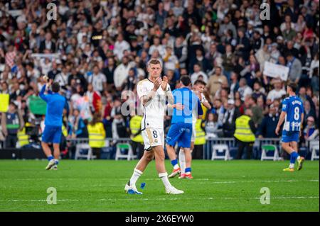 Madrid, Spain. 14th May, 2024. MADRID, SPAIN - MAY 14: Toni Kroos of Real Madrid cheers the fans at the end of the La Liga EA Sports 2023/24 football match between Real Madrid vs Deportivo Alaves at Estadio Santiago Bernabeu on May 14, 2024 in Madrid, Spain. Credit: SOPA Images Limited/Alamy Live News Stock Photo