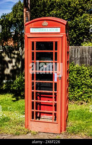 Defibrillator in a red telephone box, Hertford Heath, Sunday, May 05, 2024.Photo: David Rowland / One-Image.com Stock Photo