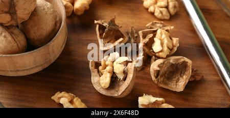 Tasty walnuts on wooden background, closeup Stock Photo