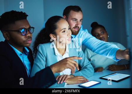 Office, teamwork for diversity for colleagues, dark and technology for collaboration on project. Tablet, smartphone and discussion or planning on Stock Photo