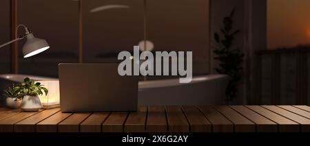 A laptop computer on a wooden tabletop in a modern luxurious bathroom with a bathtub near the large window at night. workspace close-up image 3d rende Stock Photo