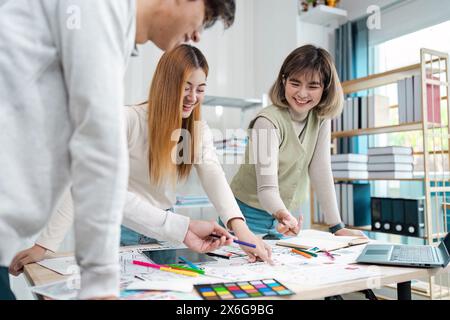 team of UI UX web designer are working together to develop mobile responsive websites with UI UX front end designer previews Stock Photo