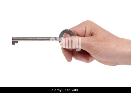 Old key in his hand, highlighted on white background Stock Photo