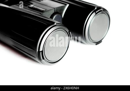 Black binoculars close up on a white background. binocular Stock Photo