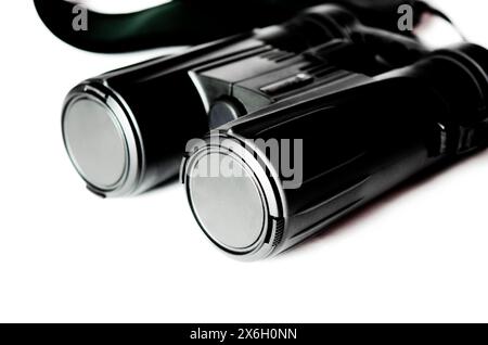 Black binoculars close up on a white background. binocular Stock Photo