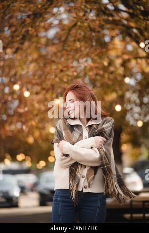 Beautiful Redhead Woman Wearing Folk German Dirndl Looking At Two Beer 