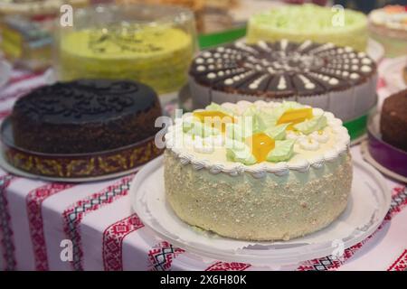 Beautiful cakes on display at market. Food Stock Photo