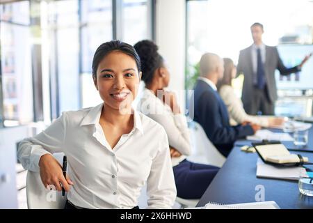 Woman, employee and smile on portrait in boardroom with pride for career grow and opportunity as accountant. Female person, people and office for Stock Photo
