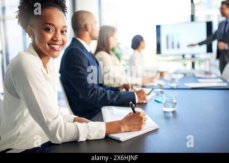 Woman, employee and happy on portrait in boardroom with pride for career grow and opportunity as accountant. Female person, people and office for Stock Photo
