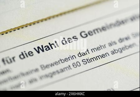 Stuttgart, Germany. 15th May, 2024. A ballot paper for the election of representatives to the local council lies on a table. Credit: Bernd Weißbrod/dpa/Alamy Live News Stock Photo