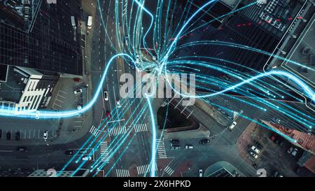VFX and E-Commerce Visualization of Information Lines Flying from Tablet into Global Digital Network. Top Down Aerial Drone Shot in Business Downtown District. Stock Photo