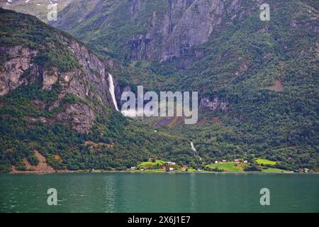 Norway fiord landscape. Lustrafjorden fiord in Luster municipality of Vestland county. View with Feigumfossen Waterfall. Stock Photo