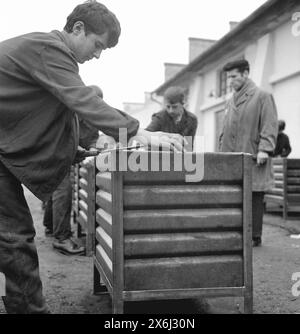 Socialist Republic of Romania in the 1970s. Students being trained to work various jobs in a state-owned factory. Stock Photo