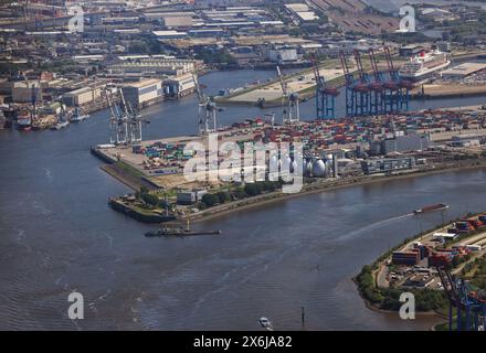 Hamburg, Germany. 14th May, 2024. View of Hamburg Wasser's VERA sewage sludge incineration plant on the Köhlbranddeich (aerial view) next to the Tollerort container terminal. Credit: Christian Charisius/dpa/Alamy Live News Stock Photo