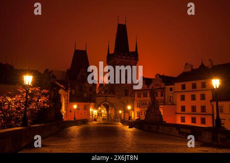 Charles Bridge towards the Lesser Town at night and in the fog Stock Photo