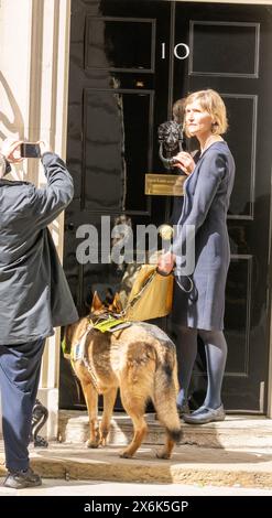 London, UK. 15th May, 2024. The National Federation of the Blind UK present petitions to 10 Downing Street on the dangers of floating bus stops for sight impared users; they were accompaned by Finn, the guide dog. Credit: Ian Davidson/Alamy Live News Stock Photo