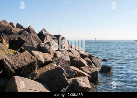 large rocks boulders form the new sea defences along the foreshore ...