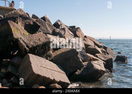 large rocks boulders form the new sea defences along the foreshore ...