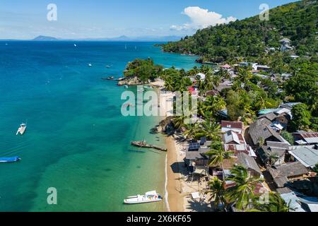 Aerial view of boats, beach and village, Nosy Komba, Diana, Madagascar, Indian Ocean Stock Photo