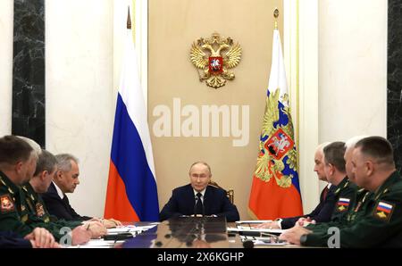 Moscow, Russia. 15th May, 2024. Russian President Vladimir Putin chairs a meeting with commanders of the military districts at the Kremlin, May 15, 2024, in Moscow, Russia. Credit: Vyacheslav Prokofyev/Kremlin Pool/Alamy Live News Stock Photo