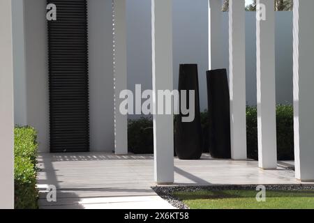Pots made out of a Date Palm Tree Trunk The Chedi Hotel Muscat Oman Stock Photo