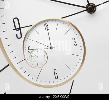Infinity and other time related concepts. White clock face twisted in spiral, fractal pattern Stock Photo