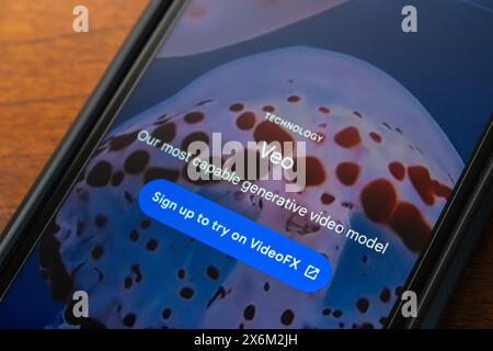 Google Veo website seen in an iPhone. Veo is a video generation model that can generate 1080p videos over a min long in a wide range of visual styles Stock Photo