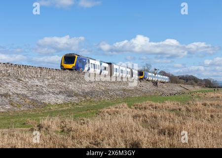 24/3/24 Grange Over Sands, Cumbria. Northern Rail class 195 trains that derailed on 22 March after a sink-hole opened under the line Stock Photo