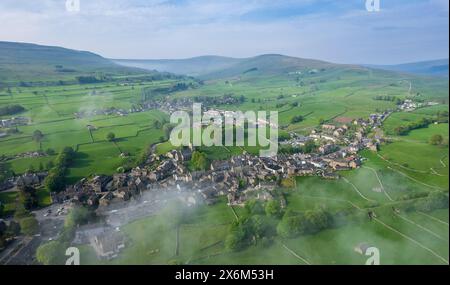 The market town of Hawes taken from a drone on a misty spring morning ...