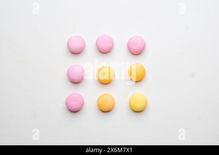 Close up a Few Gum Balls Isolated color Blue, Green, Yellow, on a White Background Stock Photo