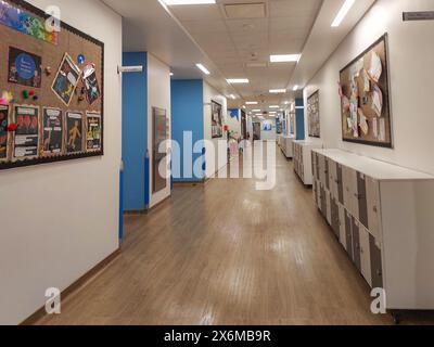 Empty classroom with chairs and tables in campus. Daycare center without children and teacher Stock Photo