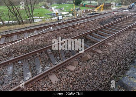 Hole under the railway line at Grange Over Sands Cumbria that caused the train derailment on 22 March 2024 Stock Photo