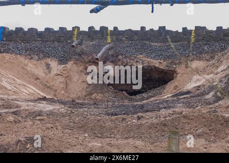 Grange Over Sands, site of the sink-hole that derailed a train 22/3/24, void under sea wall visible. Stock Photo