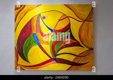 Fragment of an oil painting. Drawn bright multi-colored fish. Abstract colorful background. Abstract painting oil color on canvas,Fragment of artwork. Stock Photo