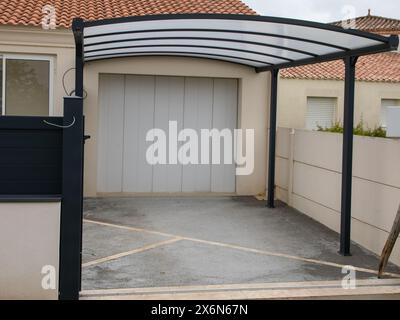 carport on facade garage house like car patio pergola roof Stock Photo