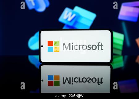 Microsoft corporation logo on smartphone screen.  Stock Photo