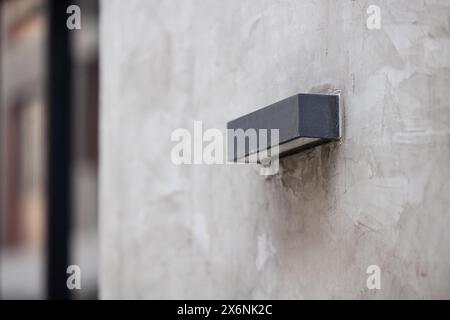 outdoor lighting lamp box downlight wall mount modern design for office building on cement wall Stock Photo