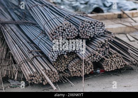 Round Bar Steel high strength for construction concrete casting industry, long line cylindrical metal bar stock. Stock Photo