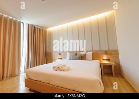 modern bedroom interior elegant luxury comfort with lighting decoration in the morning Stock Photo