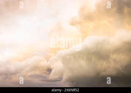 Cumulonimbus storm clouds in a dramatic stormy sky during the day. Ideal for a weather, climate or environment background Stock Photo