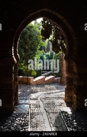 Arched gateway to the Alcazaba fortress of Malaga, Andalusia in southern Spain, with distinctive Moorish design. Stock Photo